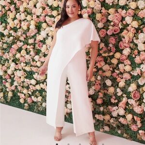Adrianna Papel PLUS SIZE FLUTTER ONE SHOULDER JUMPSUIT IN WHITE